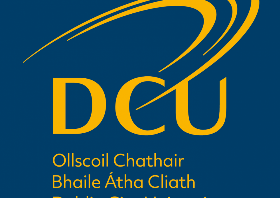 dcu_logo_stacked_slate_yellow