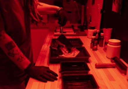 side-view-woman-developing-photos